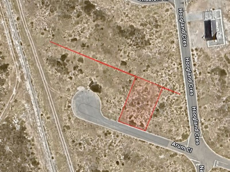 Aerial view of a vacant residential plot located at the corner of Arum Close and Hoogland Crescent, showing surrounding street infrastructure.