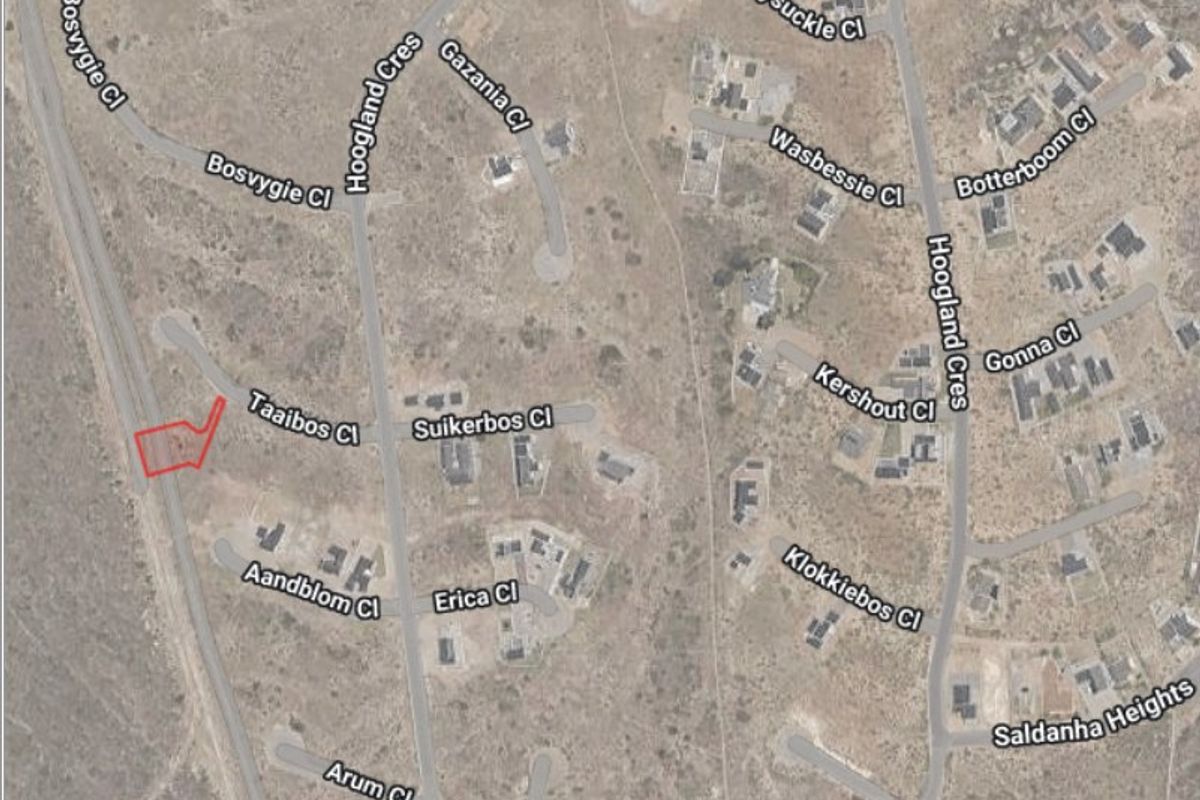Aerial view of a residential vacant land plot located within a developed estate, highlighting the property boundaries and surrounding street layout.