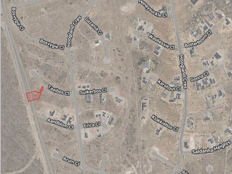 Aerial view of a residential vacant land plot located within a developed estate, highlighting the property boundaries and surrounding street layout.