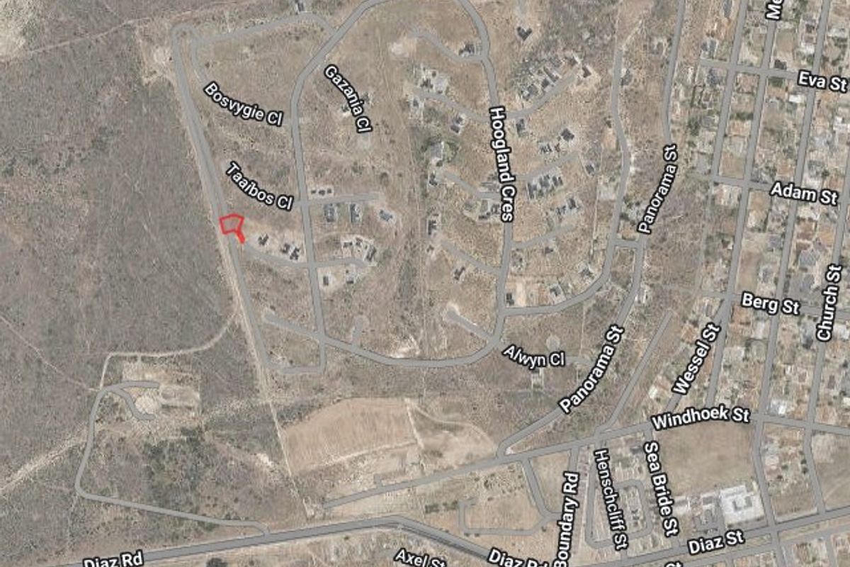An aerial satellite view showing the location of the vacant residential land plot within the surrounding neighborhood street layout.