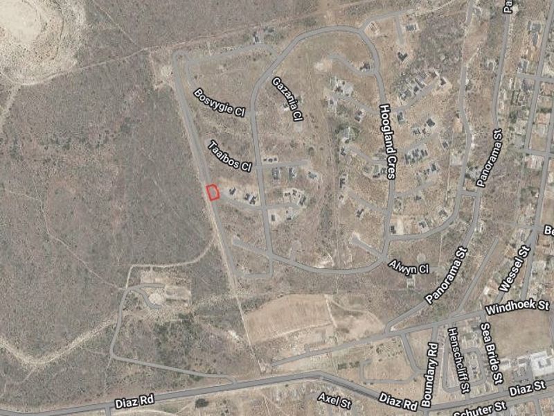 An aerial view showing the location of the vacant residential land plot within the surrounding neighborhood street layout.