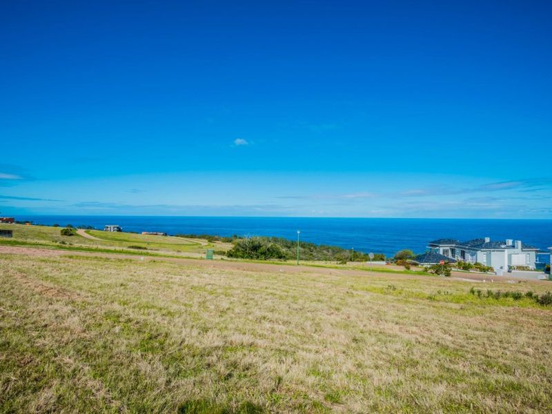 A scenic view of the coastal landscape and ocean from the vacant residential land.