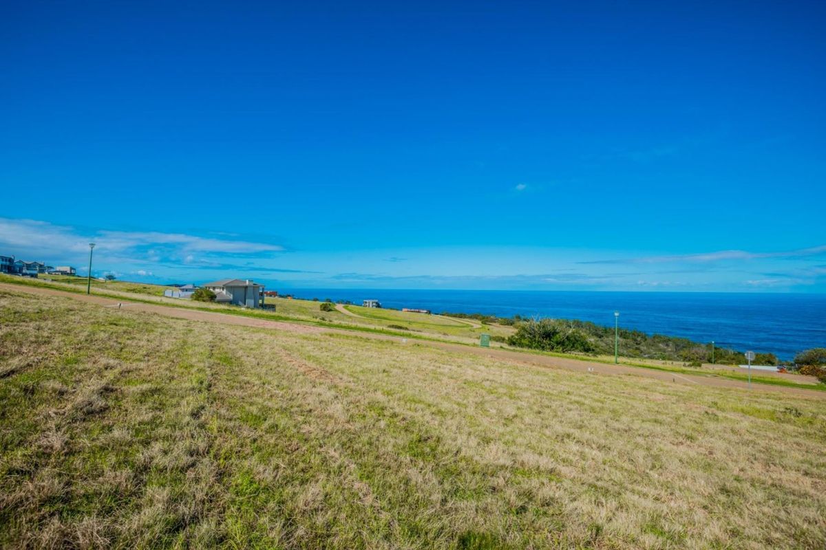 A scenic view of the coastal landscape and ocean from the vacant residential land.