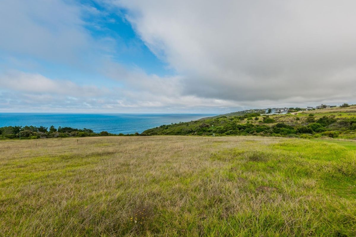 A scenic view of the coastal landscape and ocean from the vacant residential land.