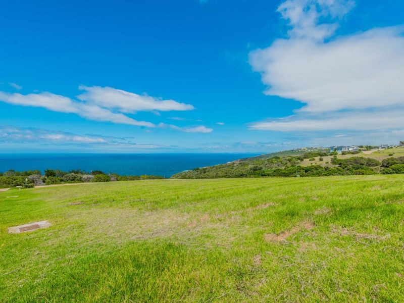 A scenic view of the coastal landscape and ocean from the vacant residential land.
