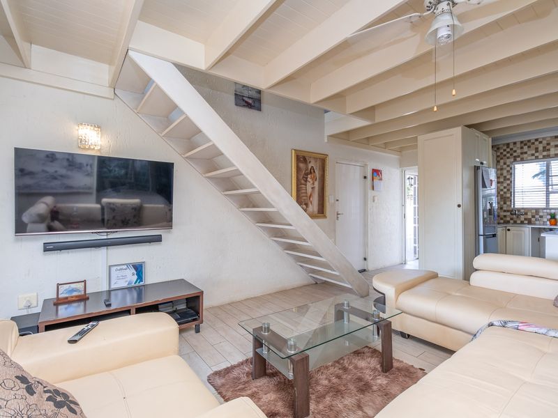 Charming Three-Bedroom Home with Cottage Appeal and Private Garden Oasis - Photo 7