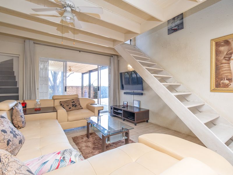 Charming Three-Bedroom Home with Cottage Appeal and Private Garden Oasis - Photo 6