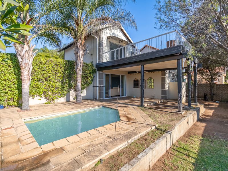 Charming Three-Bedroom Home with Cottage Appeal and Private Garden Oasis - Photo 1
