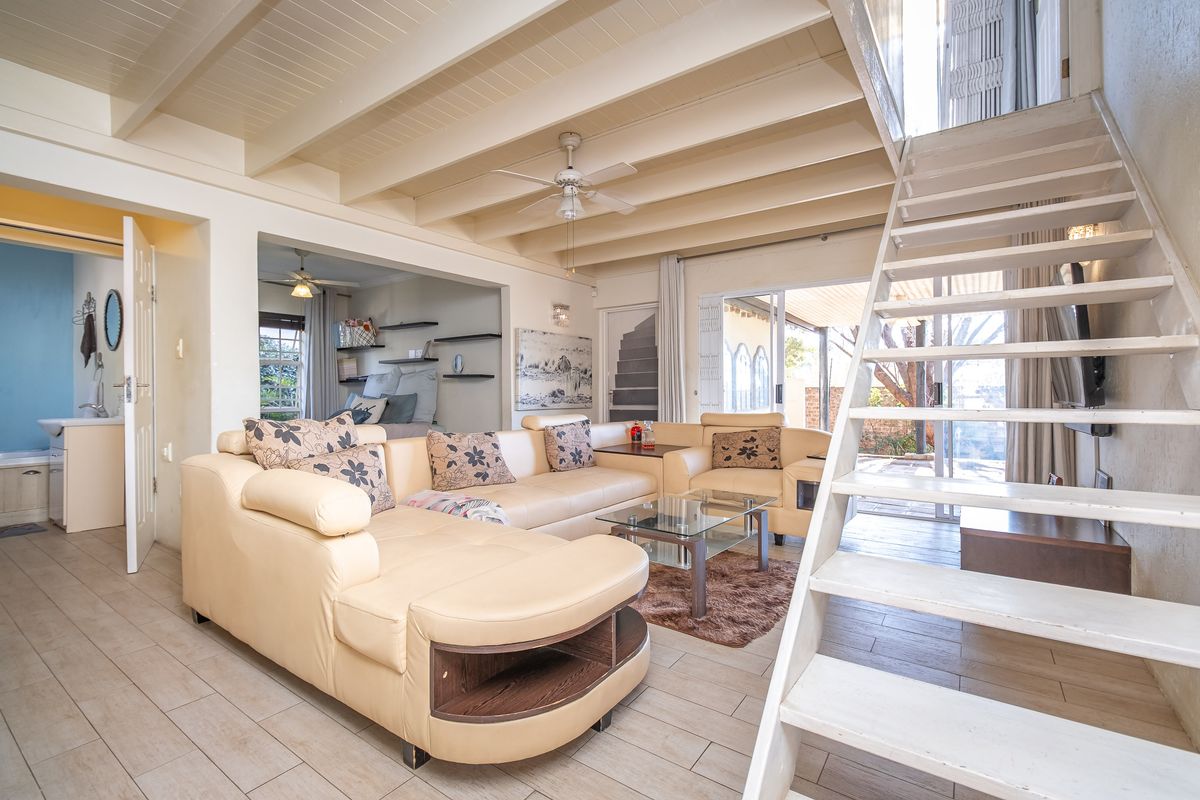 Charming Three-Bedroom Home with Cottage Appeal and Private Garden Oasis - Photo 5
