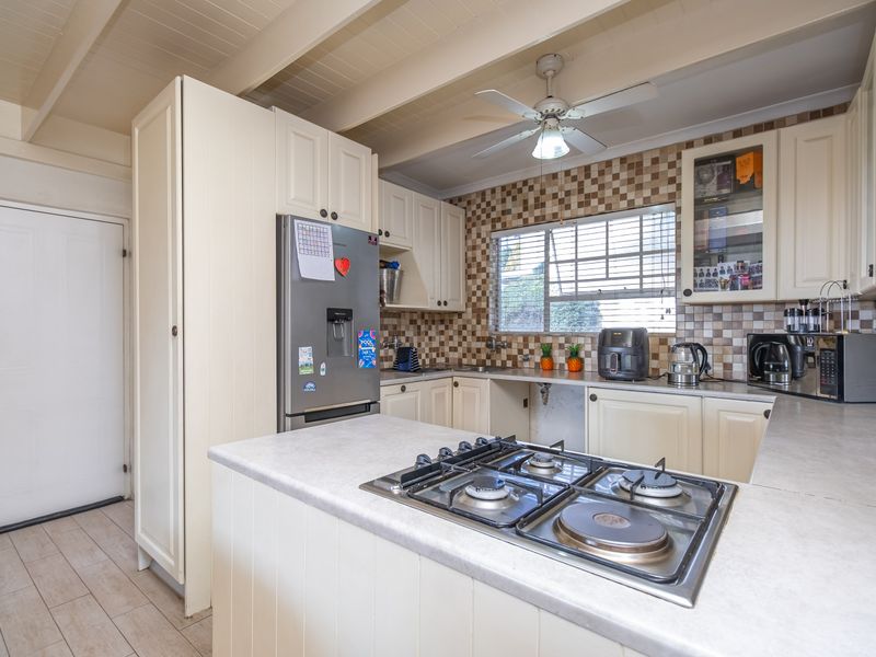Charming Three-Bedroom Home with Cottage Appeal and Private Garden Oasis - Photo 10