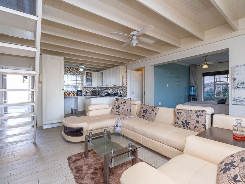 Charming Three-Bedroom Home with Cottage Appeal and Private Garden Oasis - Photo 8