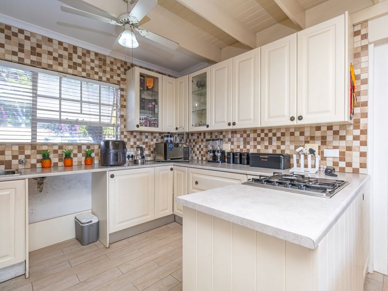 Charming Three-Bedroom Home with Cottage Appeal and Private Garden Oasis - Photo 9