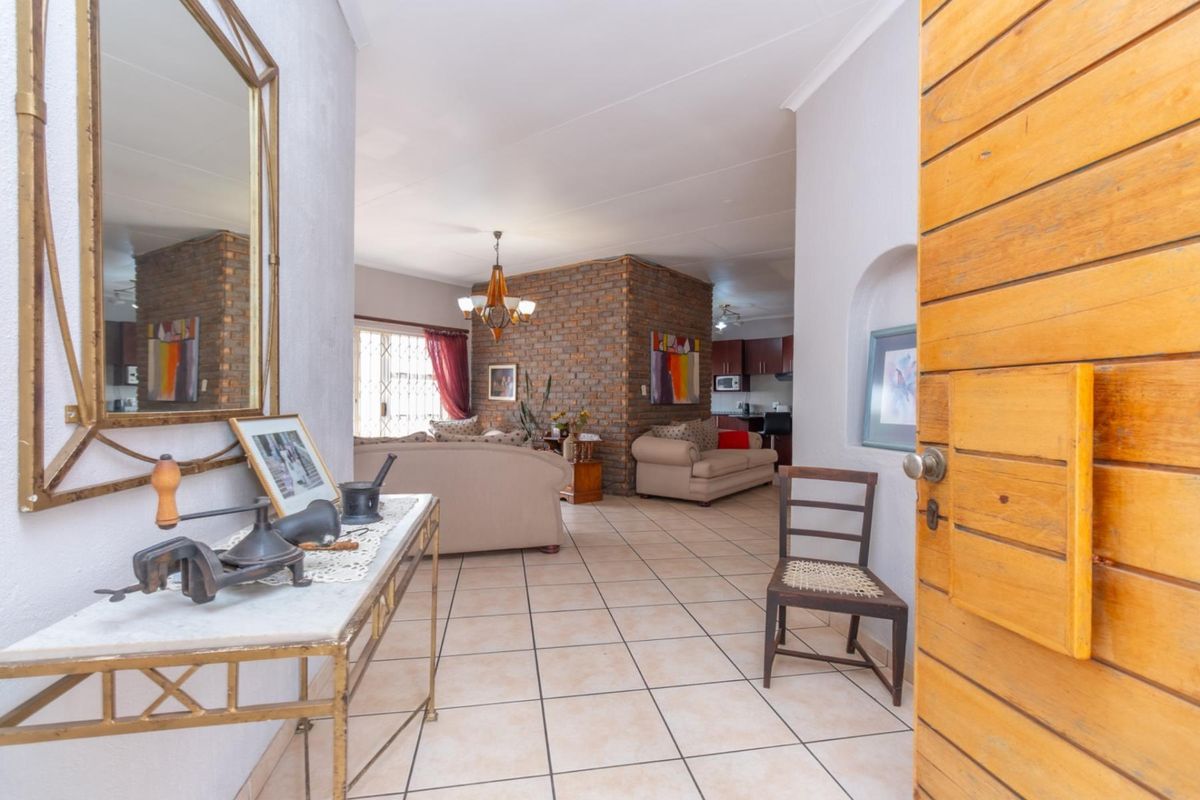 Spacious Four Bedroom Double Storey Home Nestled Against the Koppie - Photo 5