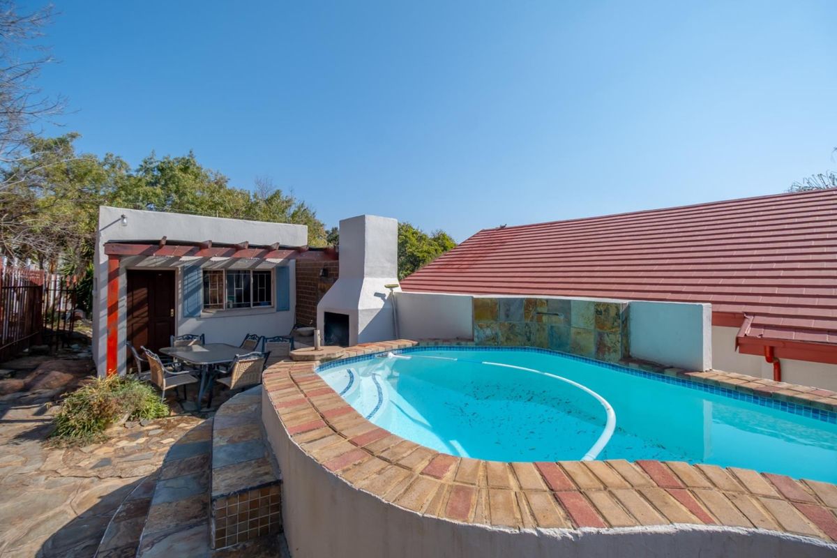 Spacious Four Bedroom Double Storey Home Nestled Against the Koppie - Photo 2