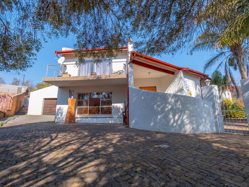 Spacious Four Bedroom Double Storey Home Nestled Against the Koppie - Photo 4