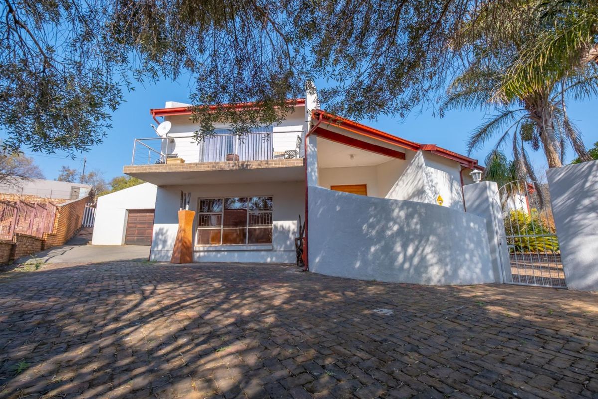 Spacious Four Bedroom Double Storey Home Nestled Against the Koppie - Photo 4