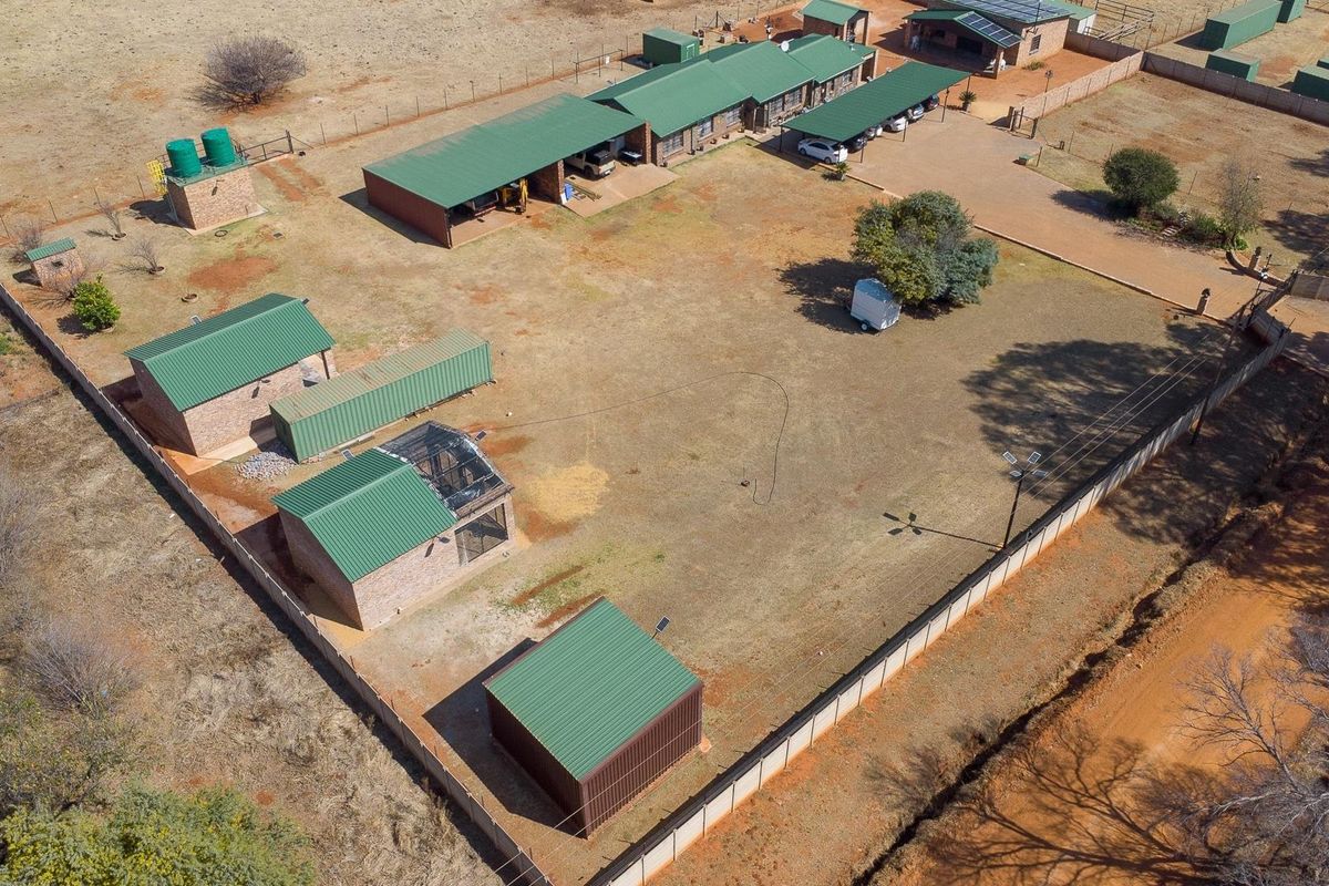 Immaculate 6.8 Hectare Property with Elegant Home, Multiple Buildings, and Complete Off-Grid Living - Photo 4