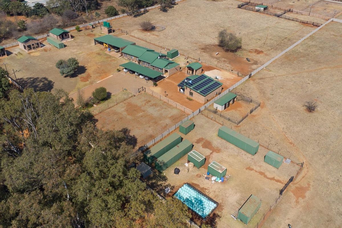 Immaculate 6.8 Hectare Property with Elegant Home, Multiple Buildings, and Complete Off-Grid Living - Photo 5