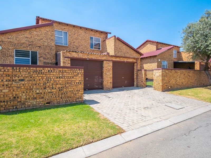 Your Dream Starts Here: Secure, Pet-Friendly Townhouse at Honey Close - Photo 1