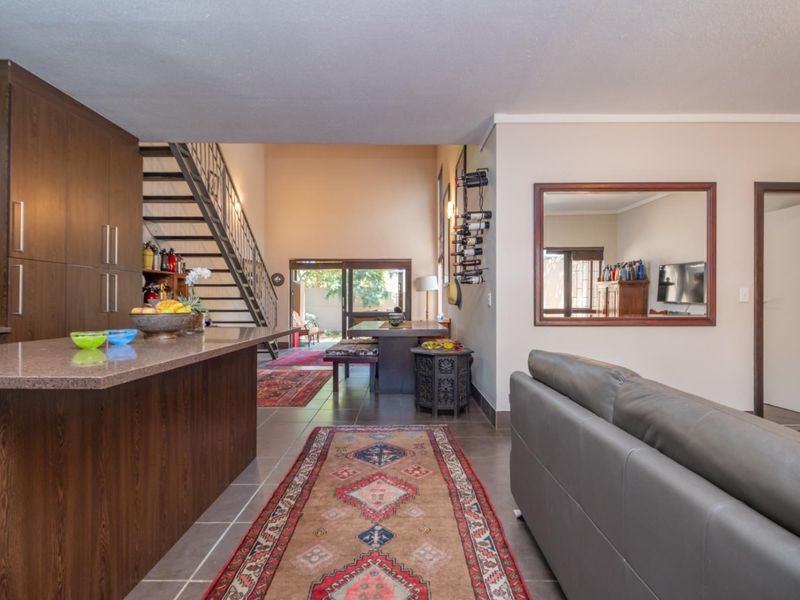 Corner Garden Unit with Loft and Wraparound Privacy within Sibiti Estate - Photo 4