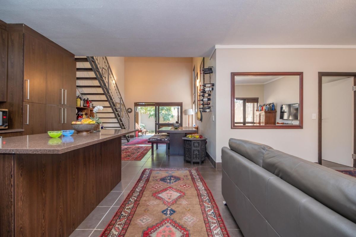 Corner Garden Unit with Loft and Wraparound Privacy within Sibiti Estate - Photo 4