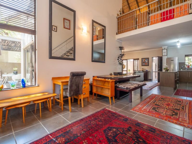 Corner Garden Unit with Loft and Wraparound Privacy within Sibiti Estate - Photo 9