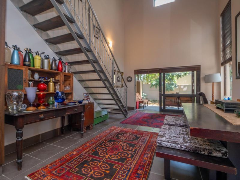 Corner Garden Unit with Loft and Wraparound Privacy within Sibiti Estate - Photo 8