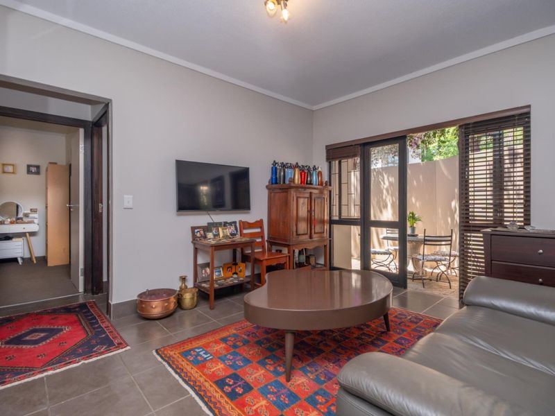 Corner Garden Unit with Loft and Wraparound Privacy within Sibiti Estate - Photo 6