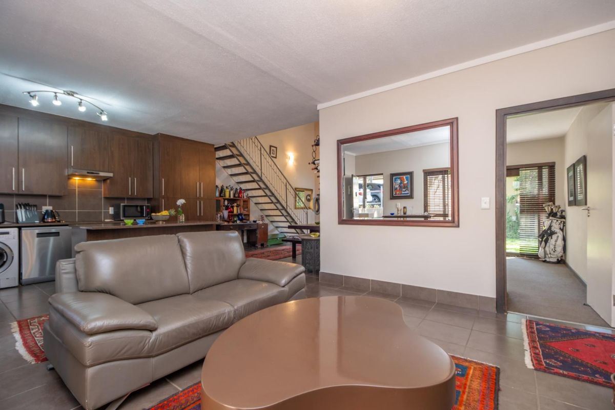 Corner Garden Unit with Loft and Wraparound Privacy within Sibiti Estate - Photo 3