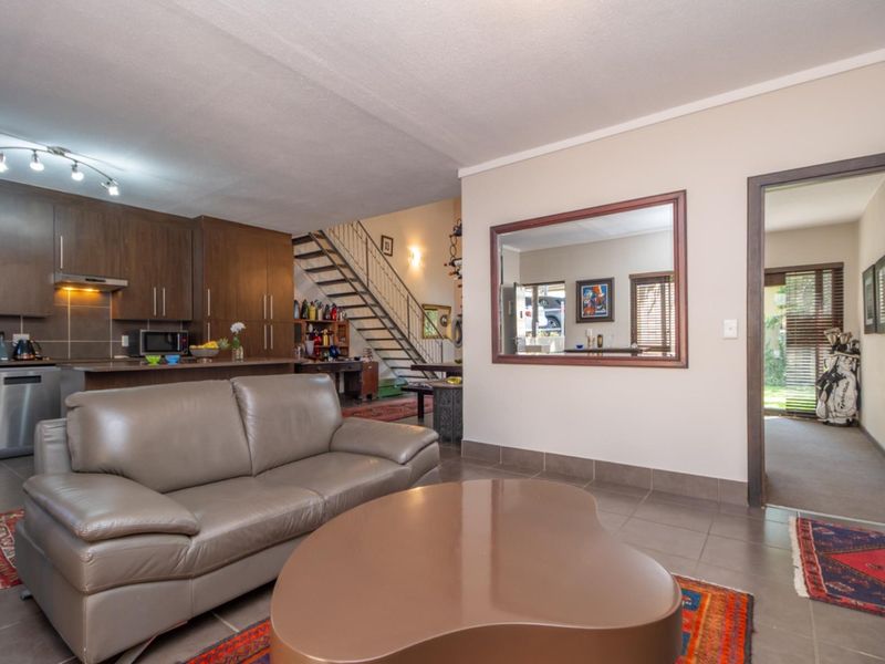 Corner Garden Unit with Loft and Wraparound Privacy within Sibiti Estate - Photo 3