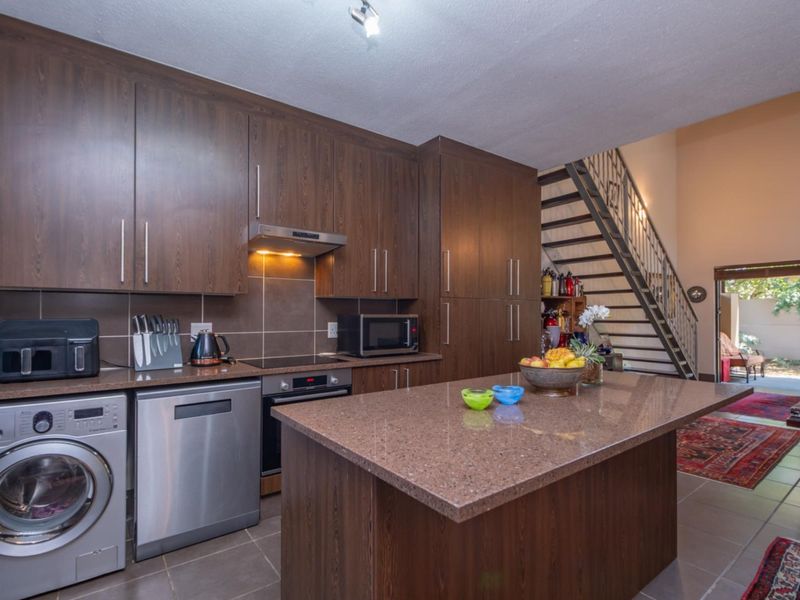 Corner Garden Unit with Loft and Wraparound Privacy within Sibiti Estate - Photo 10