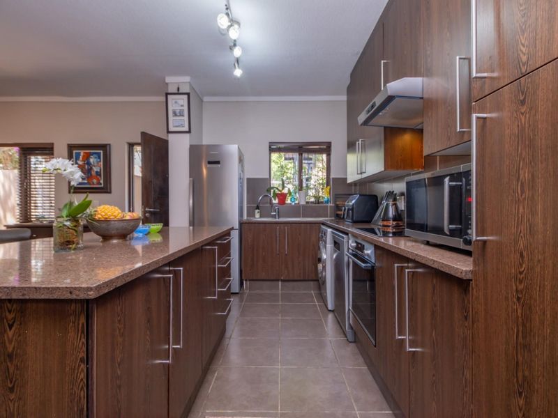 Corner Garden Unit with Loft and Wraparound Privacy within Sibiti Estate - Photo 5