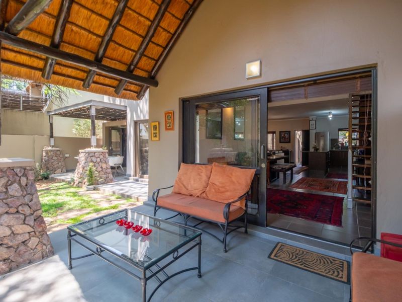 Corner Garden Unit with Loft and Wraparound Privacy within Sibiti Estate - Photo 1