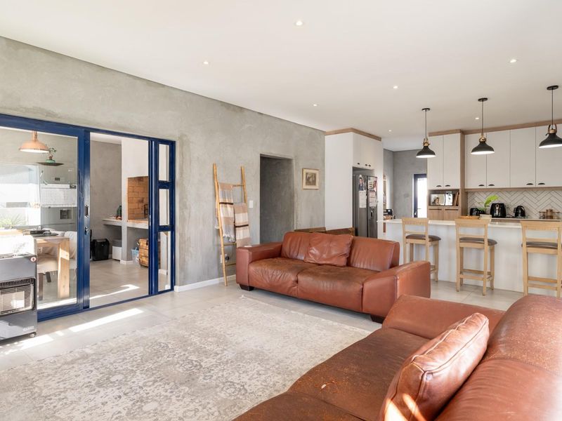 Modern 3-Bedroom Home with Pool in Sought-After Blue Lagoon - Photo 7