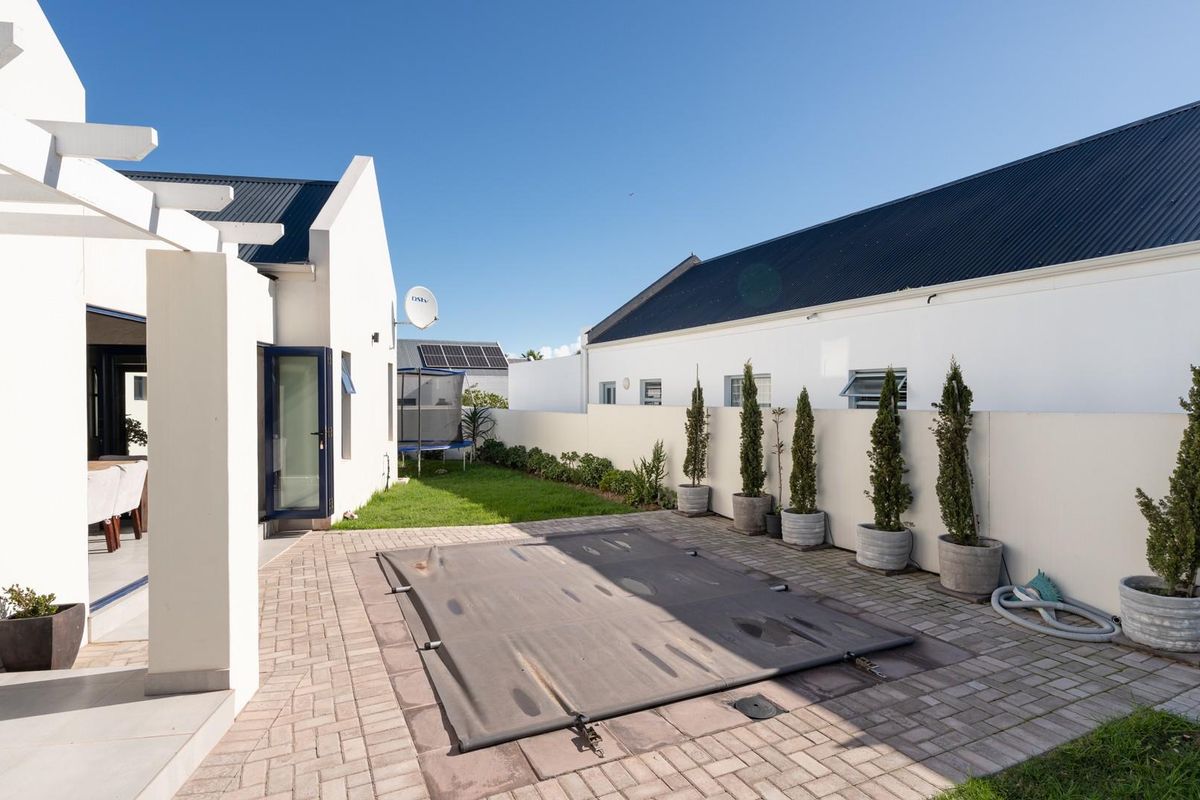 Modern 3-Bedroom Home with Pool in Sought-After Blue Lagoon - Photo 2