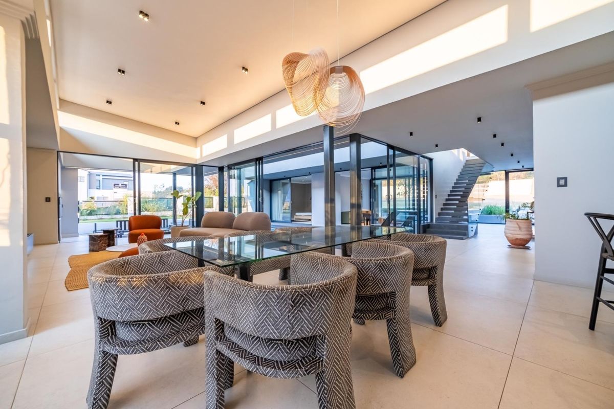 Architectural Four Bedroom Masterpiece with Dual Main Suites in Helderfontein Estate - Photo 3