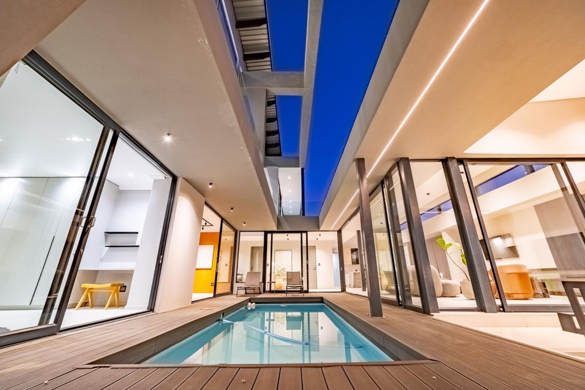 Architectural Four Bedroom Masterpiece with Dual Main Suites in Helderfontein Estate - Photo 2