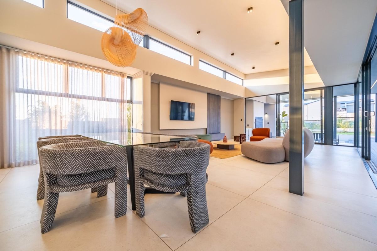 Architectural Four Bedroom Masterpiece with Dual Main Suites in Helderfontein Estate - Photo 4