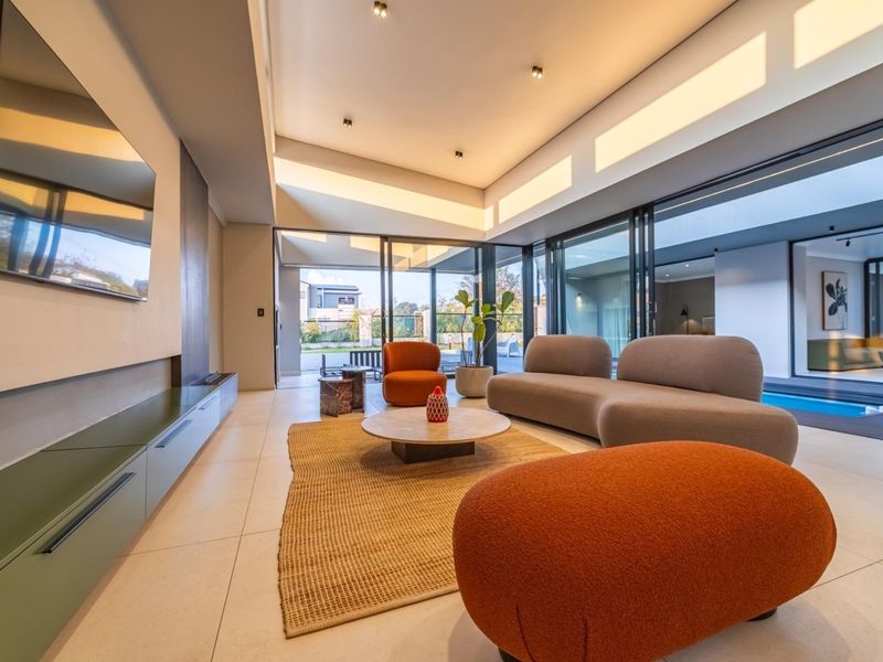 Architectural Four Bedroom Masterpiece with Dual Main Suites in Helderfontein Estate - Photo 6