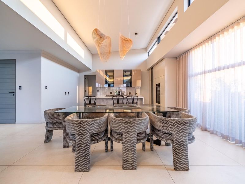 Architectural Four Bedroom Masterpiece with Dual Main Suites in Helderfontein Estate - Photo 9