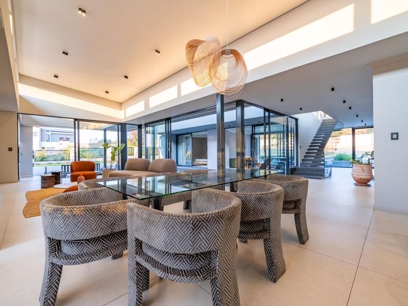 Architectural Four Bedroom Masterpiece with Dual Main Suites in Helderfontein Estate - Photo 3