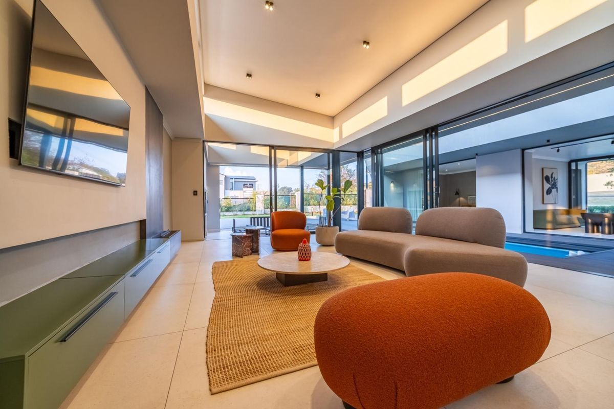 Architectural Four Bedroom Masterpiece with Dual Main Suites in Helderfontein Estate - Photo 5
