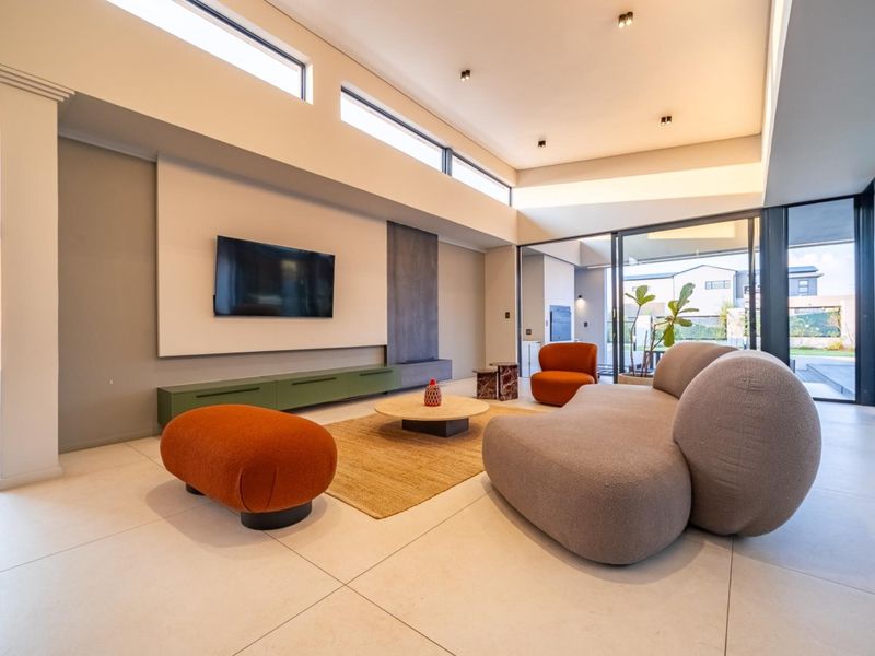 Architectural Four Bedroom Masterpiece with Dual Main Suites in Helderfontein Estate - Photo 6