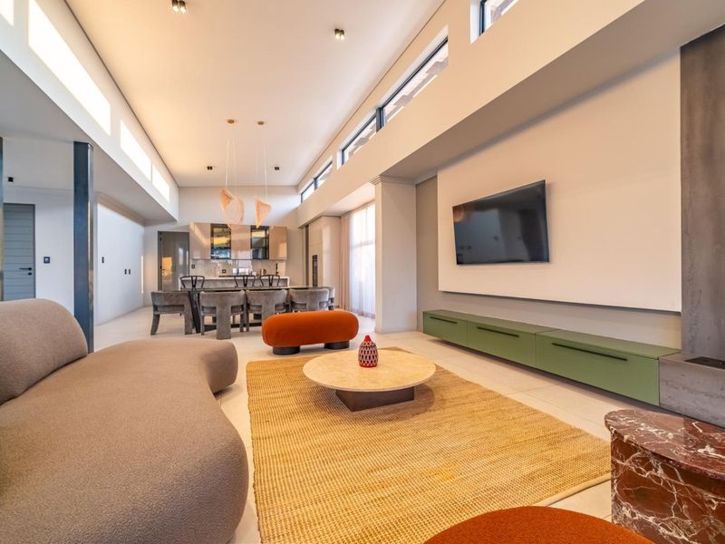 Architectural Four Bedroom Masterpiece with Dual Main Suites in Helderfontein Estate - Photo 7