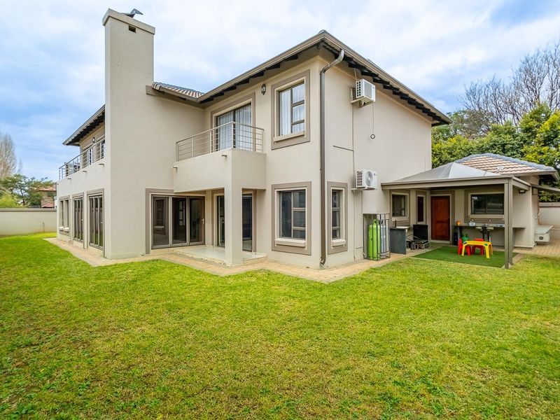Elegant Family Living in Sought-After Raslouw Glen Estate - Photo 1