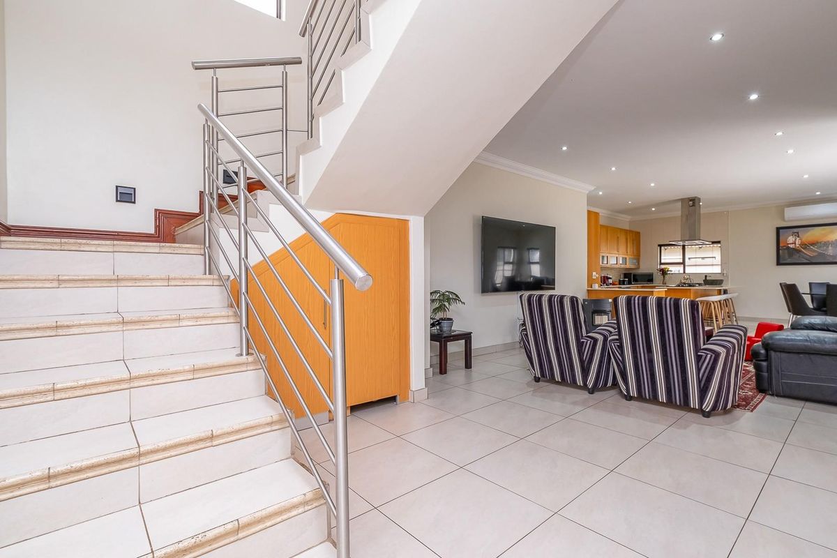 Elegant Family Living in Sought-After Raslouw Glen Estate - Photo 5