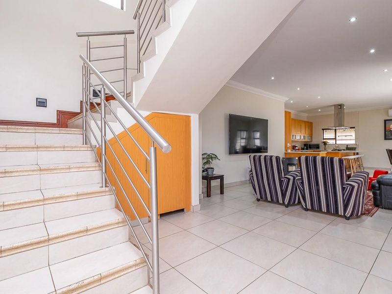 Elegant Family Living in Sought-After Raslouw Glen Estate - Photo 5