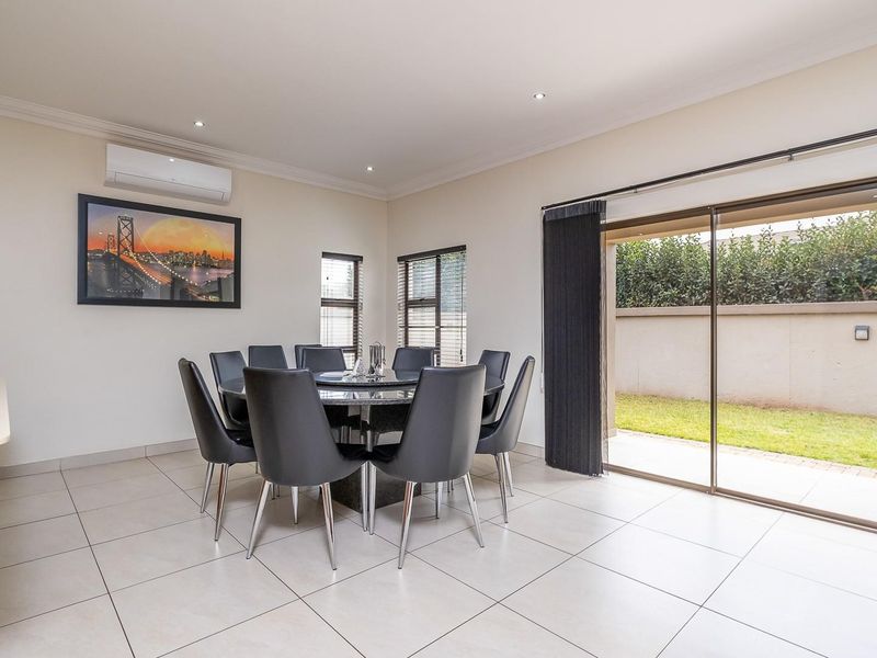 Elegant Family Living in Sought-After Raslouw Glen Estate - Photo 9
