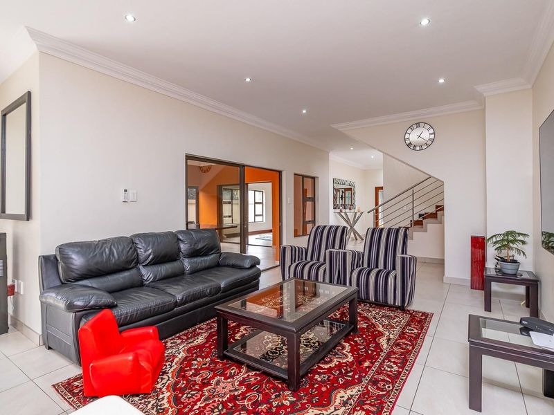 Elegant Family Living in Sought-After Raslouw Glen Estate - Photo 8