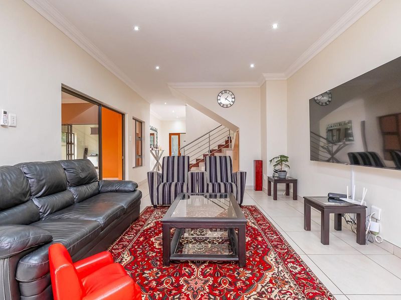 Elegant Family Living in Sought-After Raslouw Glen Estate - Photo 7